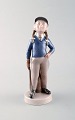 Hans Henrik 
Hansen for 
Royal 
Copenhagen. 
Figure in 
porcelain. 
Girl. Model 
number 4533.
Height: ...