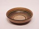 Ceramic bowl in 
different light 
brown nuances, 
stamped Stello, 
GDR, from the 
1960s. The bowl 
is ...
