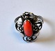 Silver ring 
with red coral, 
Hans Jensen 
&amp; Co, 
Copenhagen 
(1899 - 1937). 
Stamped. Size: 
...