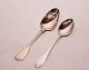 Dinner spoon in 
different 
patterns of 
hallmarked 
silver. Ask for 
number in 
stock.
22 cm and 21 
cm.