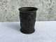 Just Andersen 
cup in disco 
metal, 11cm 
high, 9cm in 
diameter, motif 
in relief of 
flowers and ...