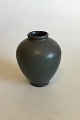 Bing & Grondahl 
Stoneware Vase 
No 570. 
Designedby H. 
Bisch Jensen. 
Measures 12 cm 
/ 4 23/32 in.