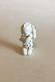 Bing & Grondahl 
Blanc de Chine 
Figurine of 
Child with 
seaweed No 
2267. Measures 
11 cm / 4 21/64 
in.
