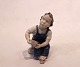 Porcelain 
figurine, 
sitting girl, 
no. 2275, by 
B&G.
H - 13 cm and 
Dia - 9 cm.
