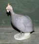 Figure in 
porcelain of 
guinea fowl. 
Made by Peter 
Herold for 
Royal 
Copenhagen in 
1909. This ...