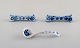 Two Stadt 
Meissen blue 
onion patterned 
knife rests and 
small spoon. 
Mid 20th 
century.
In very ...