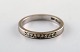 Swedish 
modernist 
alliance ring 
in 18 carat 
white gold with 
diamonds. Dated 
1988.
In very good 
...