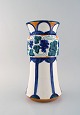 Alf Wallander 
for Rorstrand / 
Rörstrand. 
Large art 
nouveau vase in 
glazed faience 
with grapevine 
...
