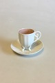 Bing & Grondahl 
Art Nouveau 
Mocha cup with 
saucer. Cup on 
four legs and 
inside with 
pink glaze. ...