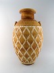 Gunnar Nylund 
for Rörstrand / 
Rorstrand. 
Colossal unique 
floor vase with 
geometric 
pattern in ...