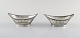 European 
silversmith. A 
pair of silver 
bowls with 
reticulated 
decoration. Ca. 
1900.
In very ...