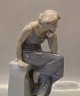 Royal 
Copenhagen 568 
RC Woman on a 
stone seat 26 
cm Axel Locher 
pre 1910 In 
mint and nice 
...