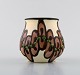 Kähler, HAK. 
Vase in glazed 
ceramics. 
Maroon flowers 
on light base. 
1930 / 40's.
Measures: 9.5 
...
