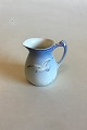 Bing & Grondahl 
Seagull with 
Gold Creamer No 
85B/393. 
Measures 9 cm / 
3 35/64 in.