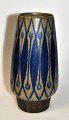 Toft, Thomas 
(1930 - 2015) 
Denmark: Vase. 
Laughs with 
gray and blue 
glaze in 
pattern. Signed 
no. ...