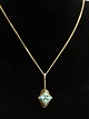 14 carat gold 
necklace 42 cm. 
and pendant 1.4 
x 3.1 cm. with 
turquoise. No. 
382630