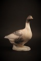 Royal 
Copenhagen 
porcelain 
figurine of a 
goose. H: 13cm.
Decoration 
number: 1088. 
...