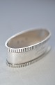 Napkin ring 
with toweres 
marks / 830 
silver, from 
year 1938. Oval 
6 x 3cm. Height 
2cm. Weight 33 
...