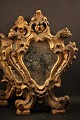 A pair of 
decorative 
French 1800 
century wall 
mirrors with 
fine decorated 
frame with old 
gilding ...