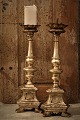 A pair of 
antique 1800's 
French 
candlesticks in 
carved wood 
with old silver 
coating and a 
really ...