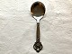 Serving spoon 
with bunches of 
grapes, 
Tretårnet 
silver (830S), 
Silver and 
stainless 
steel, Cohr ...