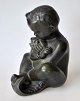Danish artist 
(20th century): 
A boy with a 
fish. Patinated 
metal / zinc. 
Signed .: KJH. 
H.: 13 ...