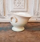 Cream-colored 
ceramic bowl 
Stamped HPK - 
Præstø - Hans 
Peter Knudsen 
1861-1950 
Measurements 
...