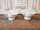 Cream colored 
ceramic bowl on 
foot with 
handle. 
Stamped: 
Seidelin - 
Faaborg 
Dimensions 12 
x ...