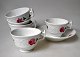 English coffee 
service in 
white porcelain 
with paintings 
of roses, 19th 
century. 
Consisting of 5 
...