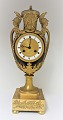 Very well kept French Empire vase shaped mantle clock of gilt and patinated bronze. Height 43 ...