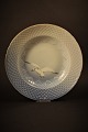 Bing & Grondahl 
deep plate in 
Seagull with 
gold edge. 
Decoration 
number: 23. 
Dia.:21cm.
(2 ...