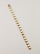 14 carat gold 
bracelet 20 cm. 
W. 0.8 cm. W. 
30 gr. from 
goldsmith Svend 
Haugaard 
Kolding. No. 
385289