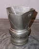 Smaller cups in 
tin. Decorated 
in Danish 
Skønvirkestil 
(Art Nouveau). 
Made at Mogens 
Ballin's ...