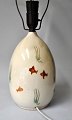 Danish 
ceramicist 
(20th century): 
Ceramic lamp, 
1930s. Clay 
with white / 
yellow glaze 
and ...