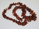 Long necklace 
with many 
pieces of 
Danish amber.
Total length 
74 cm.
Weight 85.5 
...