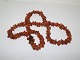 Long necklace 
with many 
pieces of 
Danish amber.
Total length 
67 cm.
Weight 56.1 
...