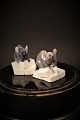 Royal 
Copenhagen 
porcelain 
figure of 
little mouse 
sitting on 
cheese. H: 4.5 
cm. Decoration 
...