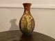 Signed 
sgraffito vase 
from Törngrens 
Krukmakeri in 
Sweden. The 
motif of the 
vase is four 
women. ...