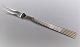Georg Jensen. 
Bernadotte 
silver cutlery. 
Sterling (925). 
Meat fork. 
Length 21 cm.