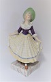 Royal 
Copenhagen. 
Figure. Elegant 
woman. Model 
1396. Height 21 
cm. There are 
small chips on 
the ...