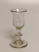 Snap glass with 
bell-shaped 
bowl Holmegaard 
cat. 1853 H. 
10.4cm. air 
bubbles appear 
in the glass 
...