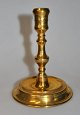 Danish Baroque 
brass 
candlestick of 
the Naestved 
type, 18th 
century. Round 
foot and 
profiled ...
