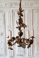 Very beautiful 
19th century 
French five-arm 
chandelier 
decorated with 
flowers and 
leaves. ...