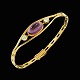 14k Gold Bangle 
/ Bracelet with 
Amethyst and 
two Diamonds 
0,20ct.
Two brilliant 
cut diamonds. 
...