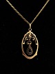 14 carat 
necklace 47.5 
cm. and pendant 
1.7 x 3 cm. 
stamped 585 
HCJ. No. 392244