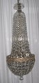 Swedish 
chandelier with 
prisms, 19th 
century. Sack 
shaped. H: 90 
cm. Dia: 35 cm. 
Middle ring ...