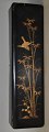 Elongated 
Japanese 
lacquer box 
with 
decorations, 
circa 1900. 
With lid. 
Decorations in 
gold with ...