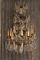 Big old crystal 
chandelier from 
the early 
1900s.
The chandelier 
is decorated 
with lots of 
large ...