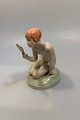 Royal 
Copenhagen 
Figurine of 
girl with 
mirror No 1244. 
Designed by 
Gerhard 
Henning. Dated 
...