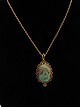 8 carat gold 
necklace 36 cm. 
with 14 carat 
pendants 2 x 
3.3 cm. No. 
396894